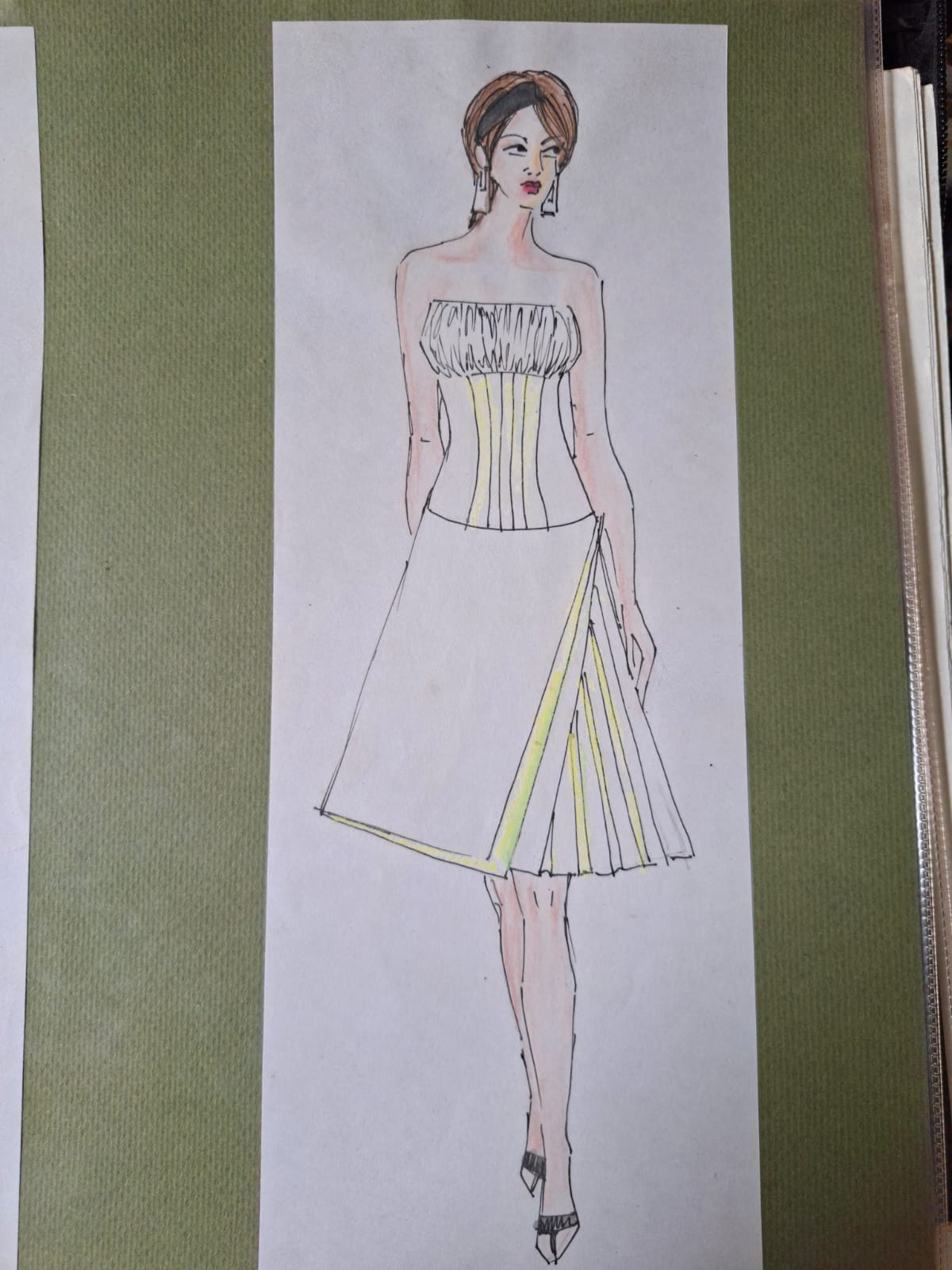 Illustration of a strapless dress with a boned corset bodice and pleated panel