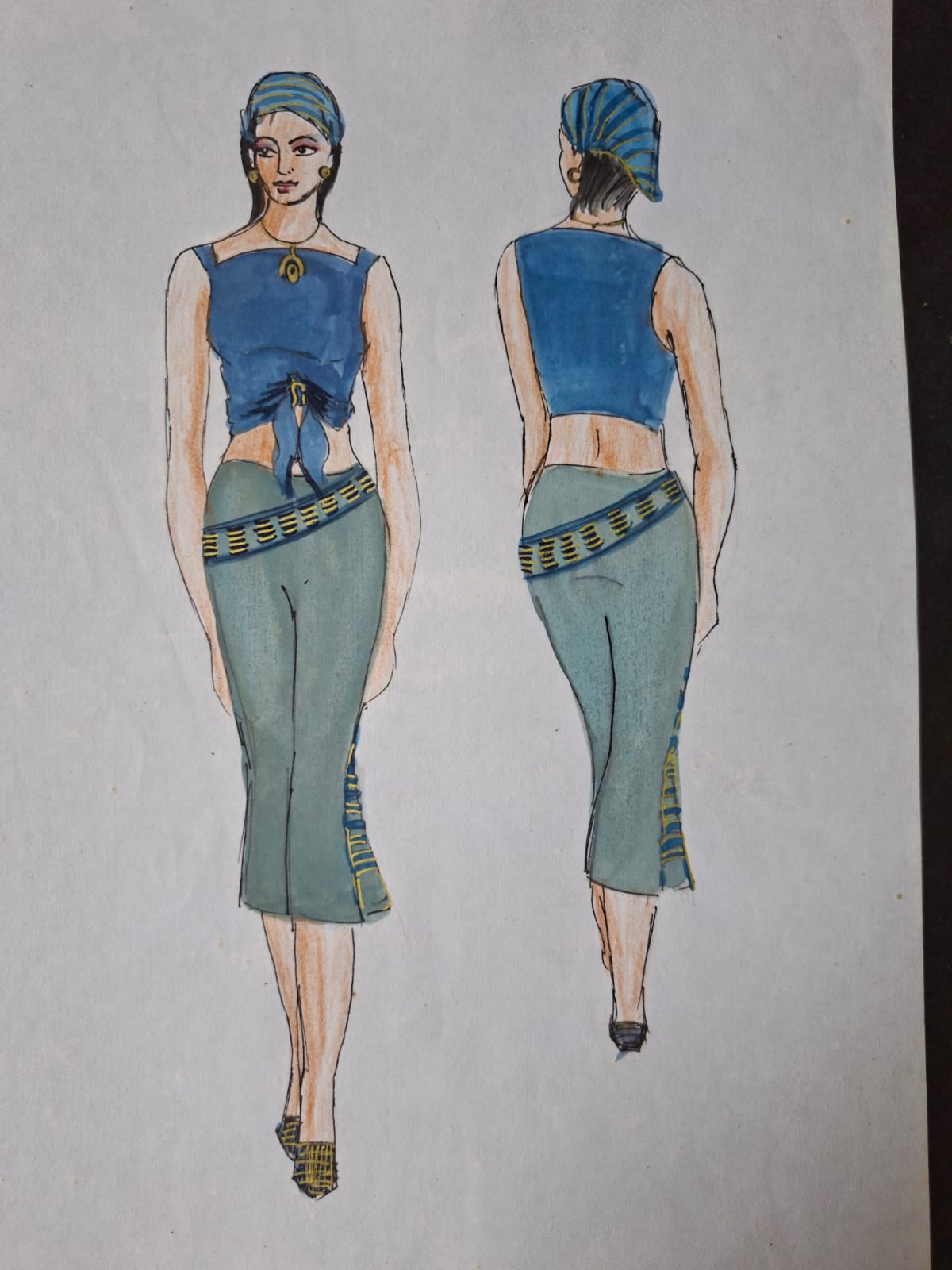 Illustration of a blue crop top and sage skirt worn with a wrapped headscarf