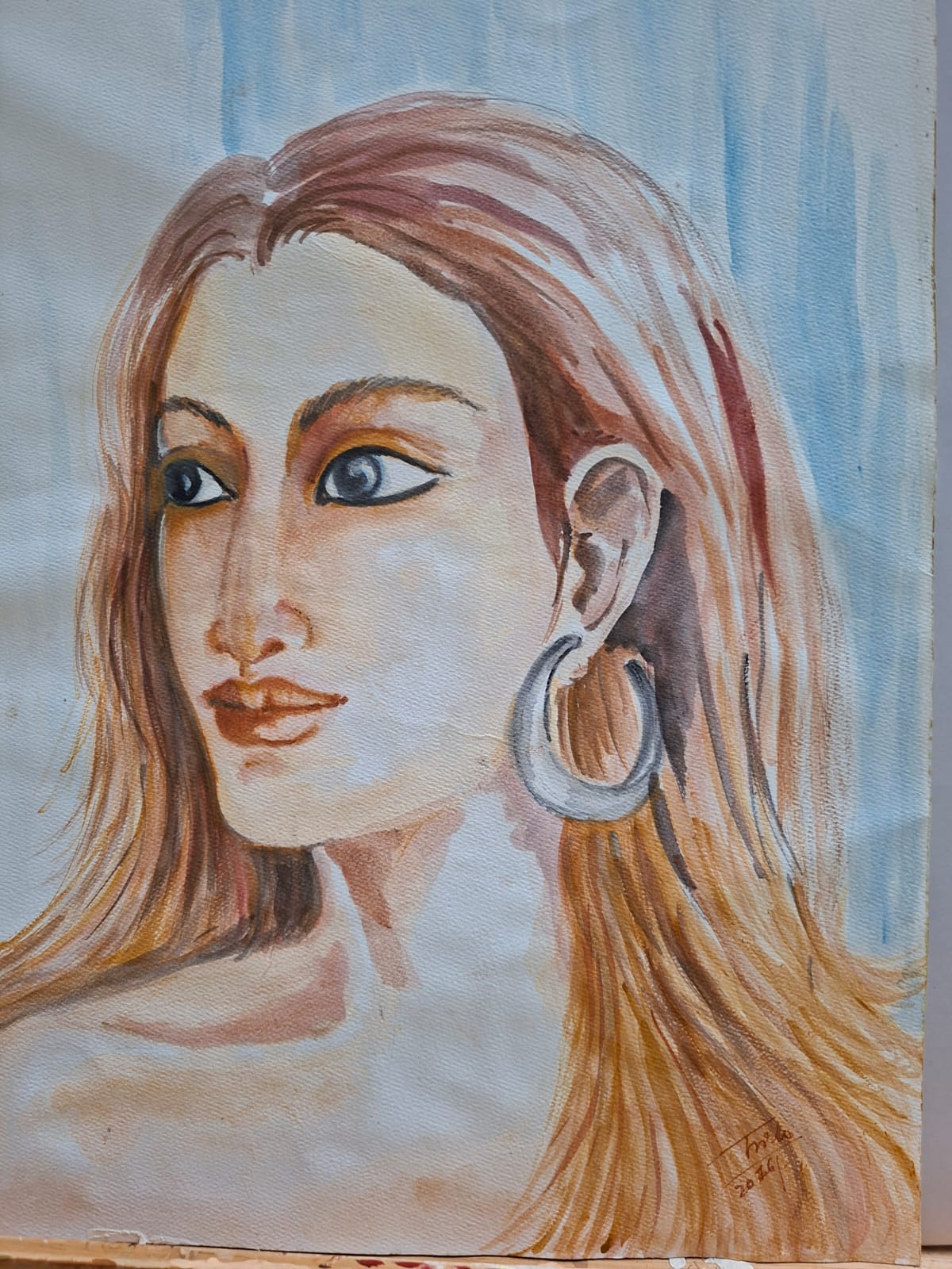 Watercolour portrait of a figure wearing a hoop earring